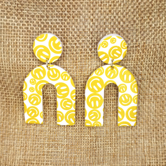 White arch with yellow smiley faces Polymer clay earrings