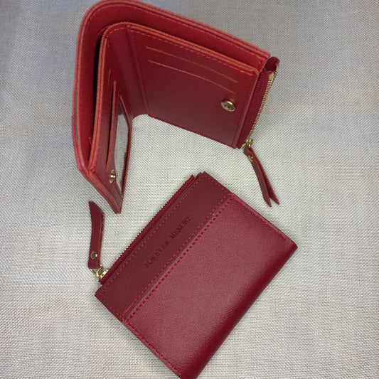 Deep red wallet with space for cash, cards and coins